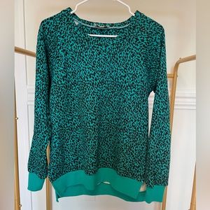 Francesca’s teal & black cheetah print sweatshirt. Bright and fun!